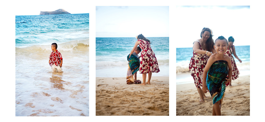 Taking a dip in the surf Hawaii family photos fun jumping in the ocean clothed
