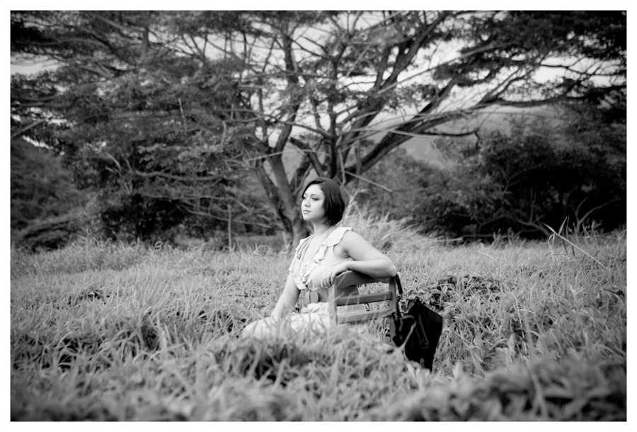 artistic senior portrait in a wild field