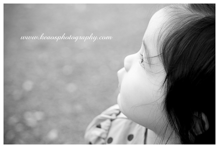 black and white photo of a baby girl