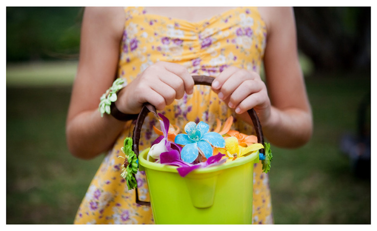 hawaii wedding photo of flower girl basket sand bucket