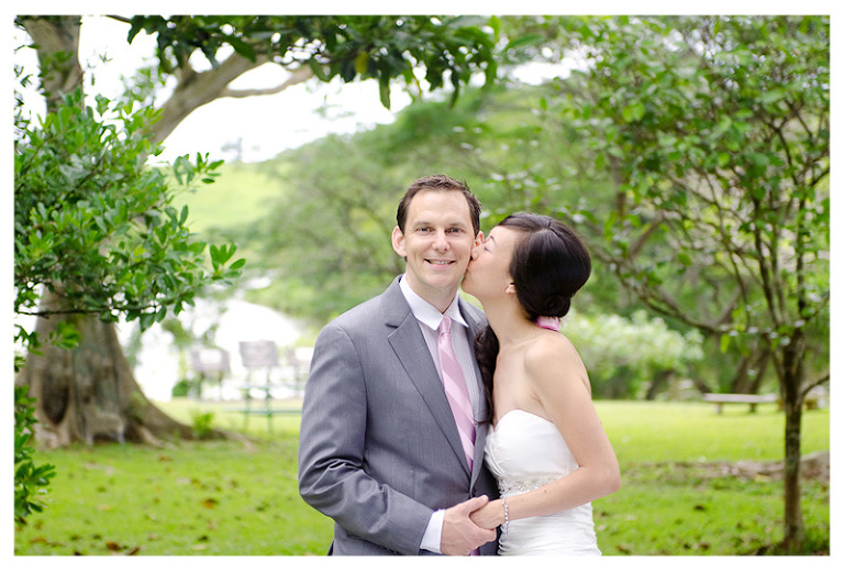 hawaii bride and groom kissing photo