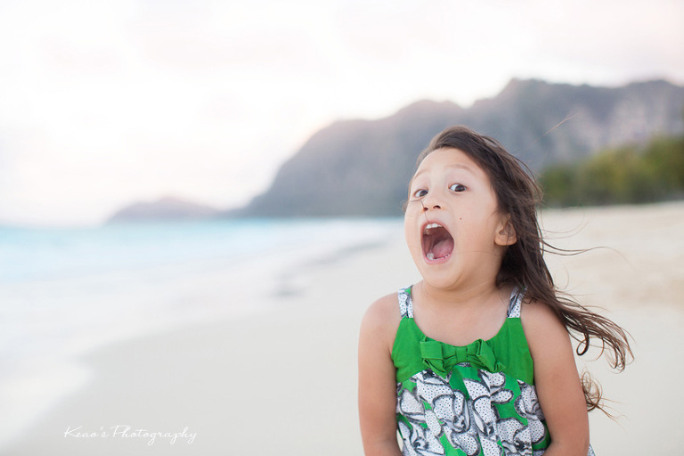 family beach photos in Hawaii can be a hoot