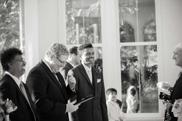a happy groom sees his bride at Paradise Cove Crystal Chapel