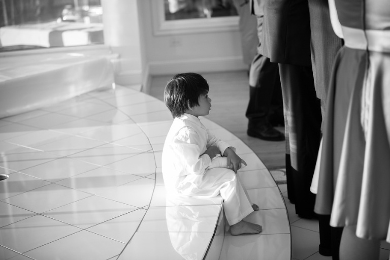 ring bearer taking at break at Paradise Cove Crystal Chapel