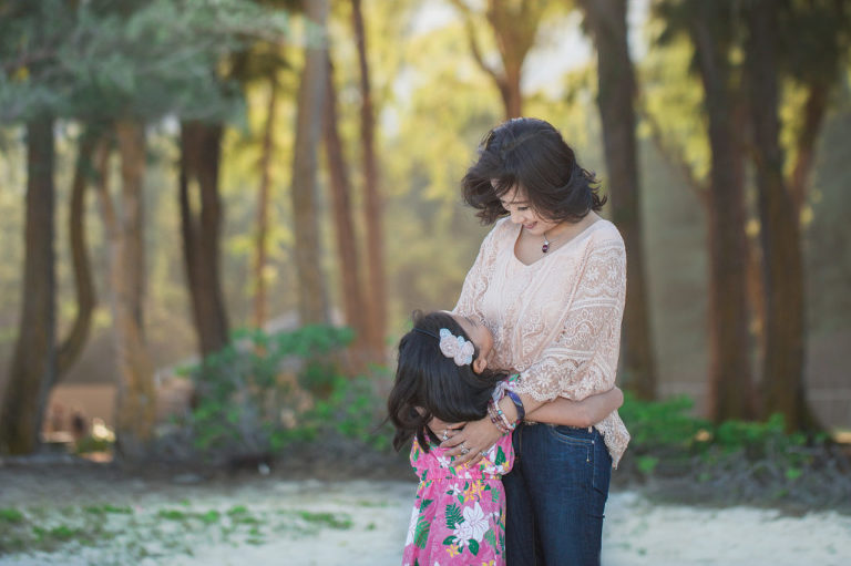 mother and daughter photo in hawaii forest