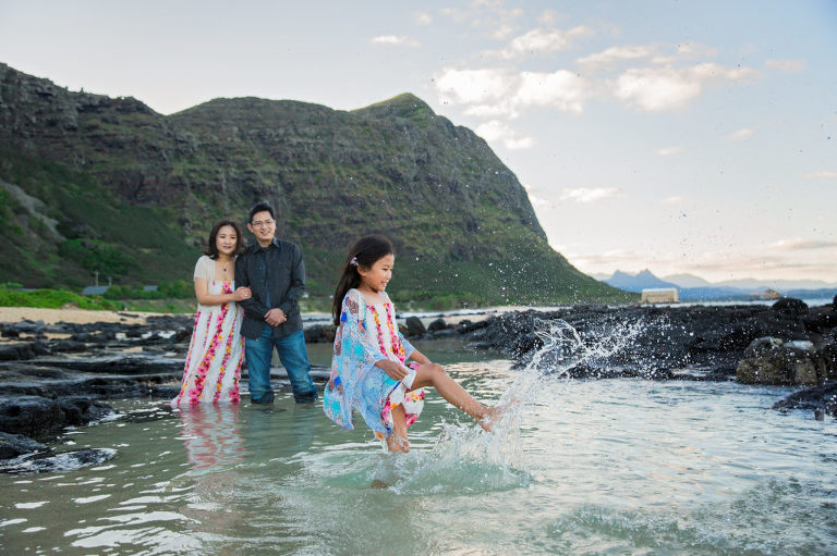 splashing fun family photo in East Oahu