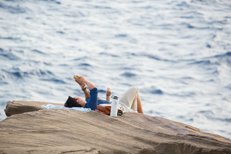 a photographer captures a couple right before the surprise proposal in hawaii