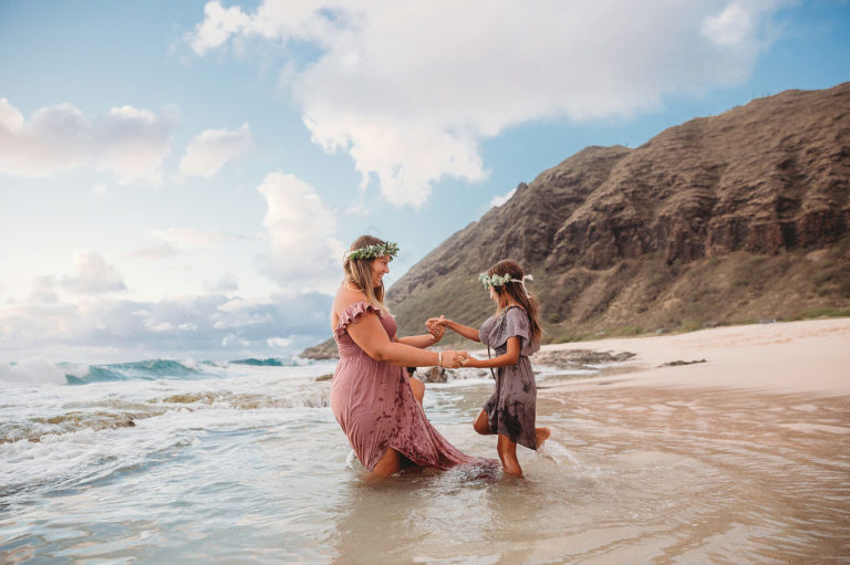 mom and daughter playing for fun family photo